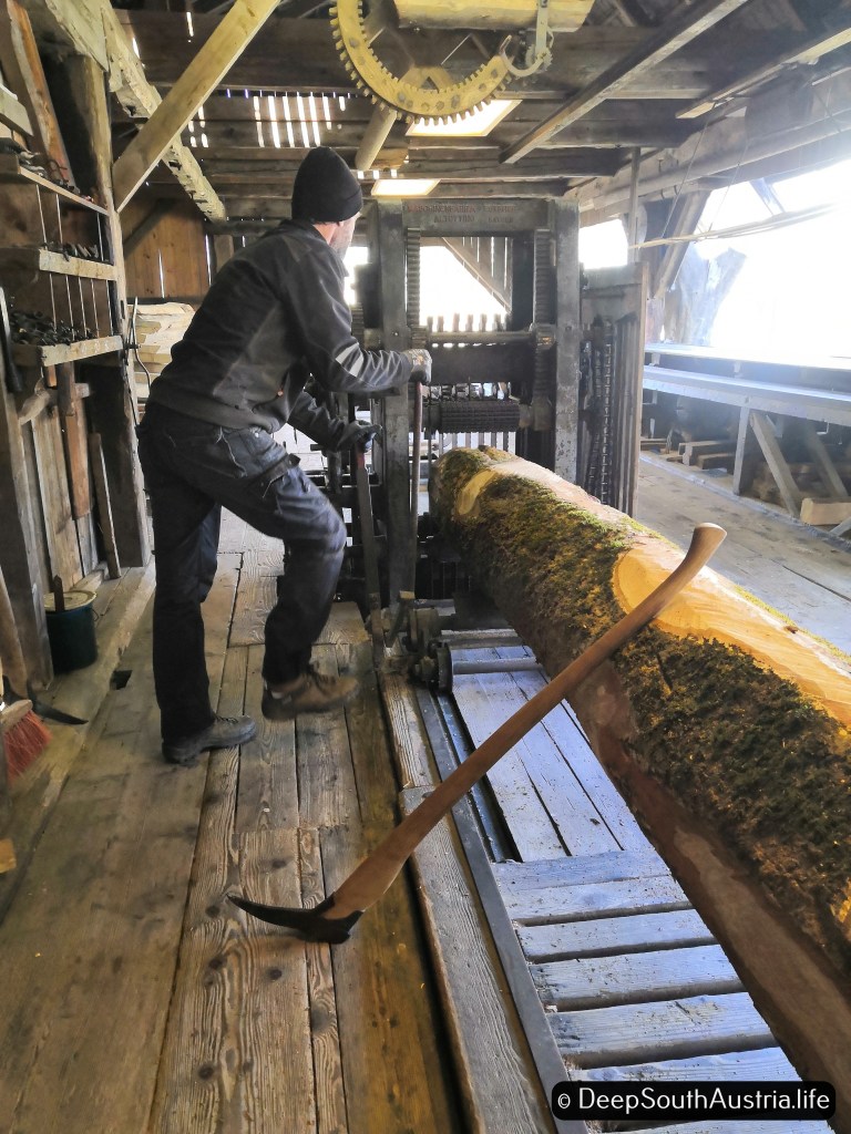 A cant hook for lifting trunks in an Austrian saw mill